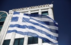 Греция погасила часть кредита МВФ в срок – Bloomberg